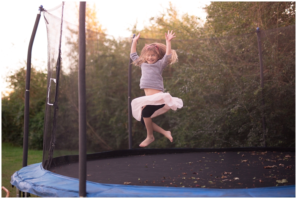 family portraits on trampoline